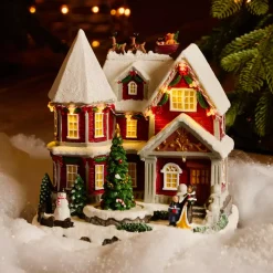 Casa del Villaggio di Natale illuminata, musicale e animata a pile (H23 cm) Camden Street