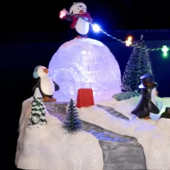Scena della vita illuminata Aera giochi dei pinguini a pile