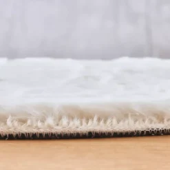 Tappeto rotondo in finta pelliccia (80 cm) Finn Bianco