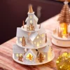 Villaggio di Natale in legno luminoso e musicale a pile (H28 cm) Case sulla collina