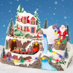 Villaggio di Natale luminoso e musicale Babbo Natale in montagna